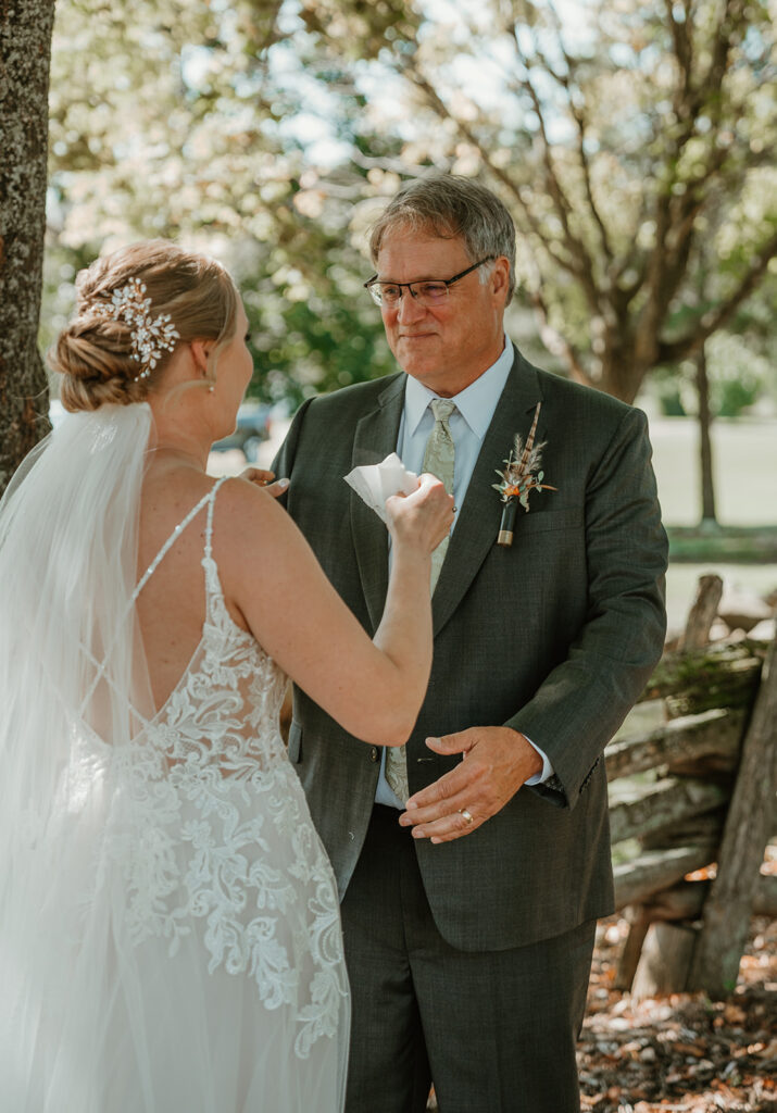 a dad getting emotional during the first look