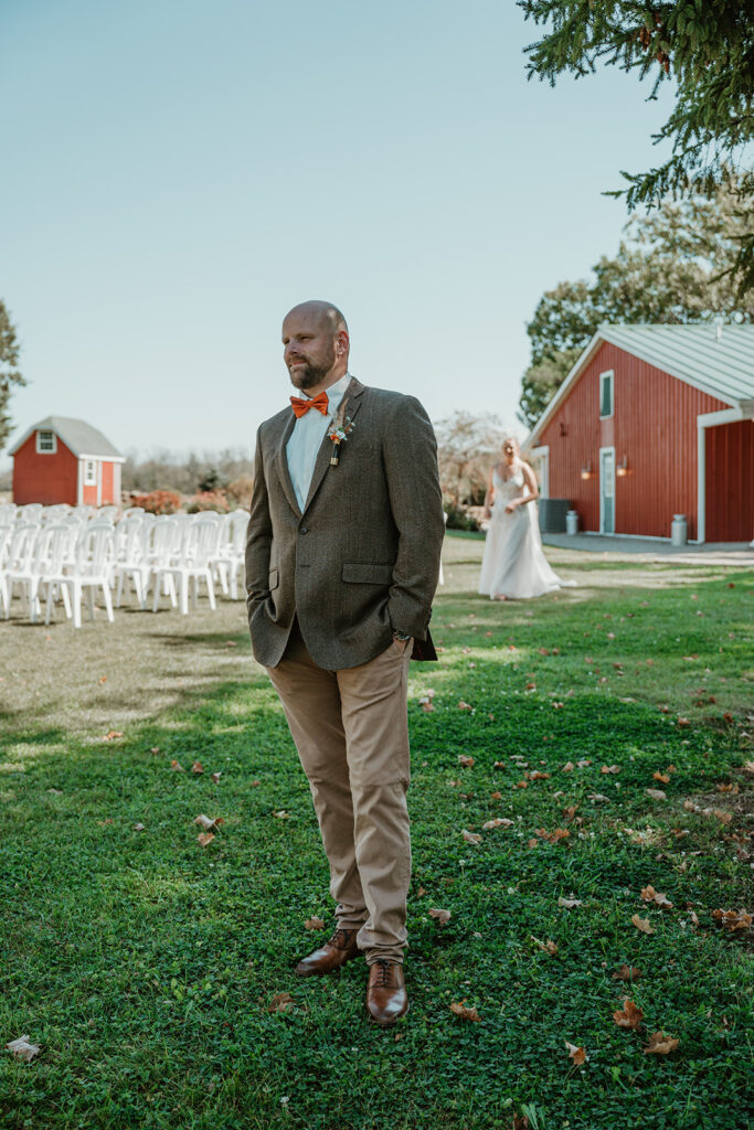 the bride walking up to the groom for their first look