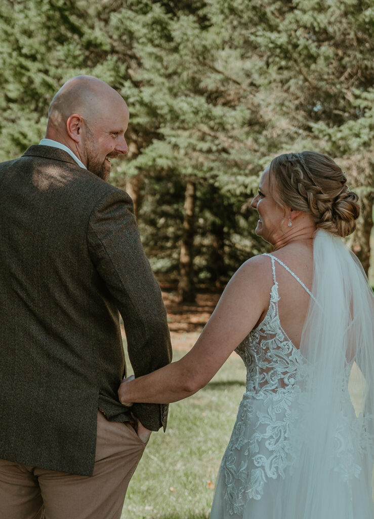 the groom is happy to finally see his bride for the first time