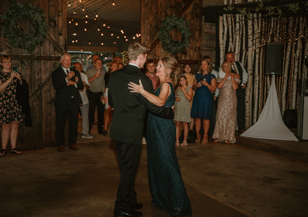 groom dancing with his mother