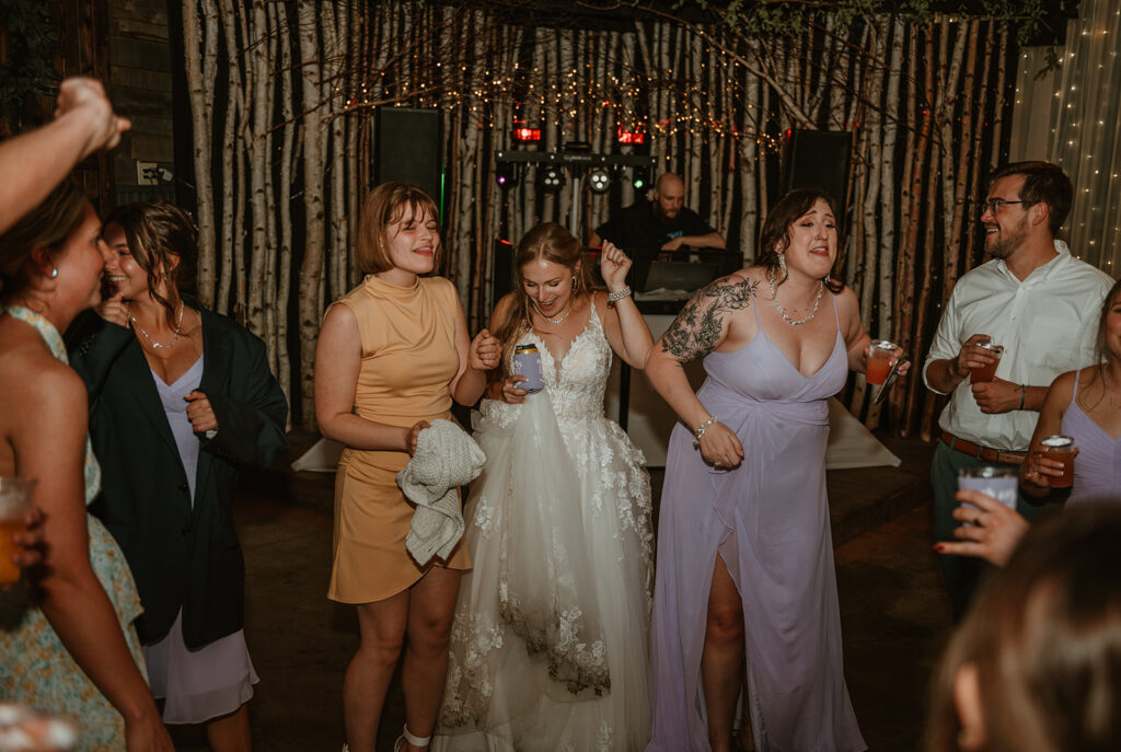 bride and her friends dancing on her wedding night