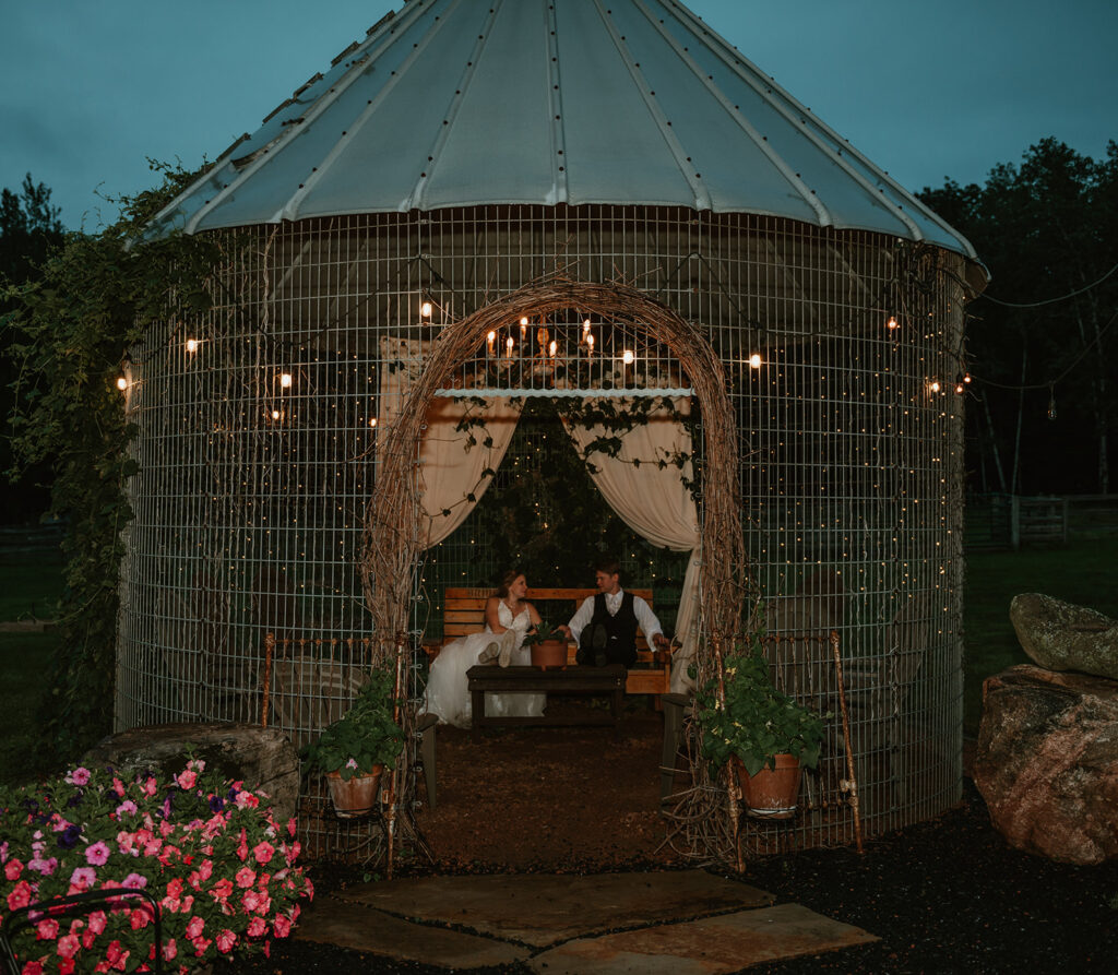 bride and groom having a moment alone during their reception at dixons apple orchard