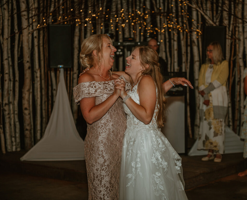 bride and mom having their mother daughter dance