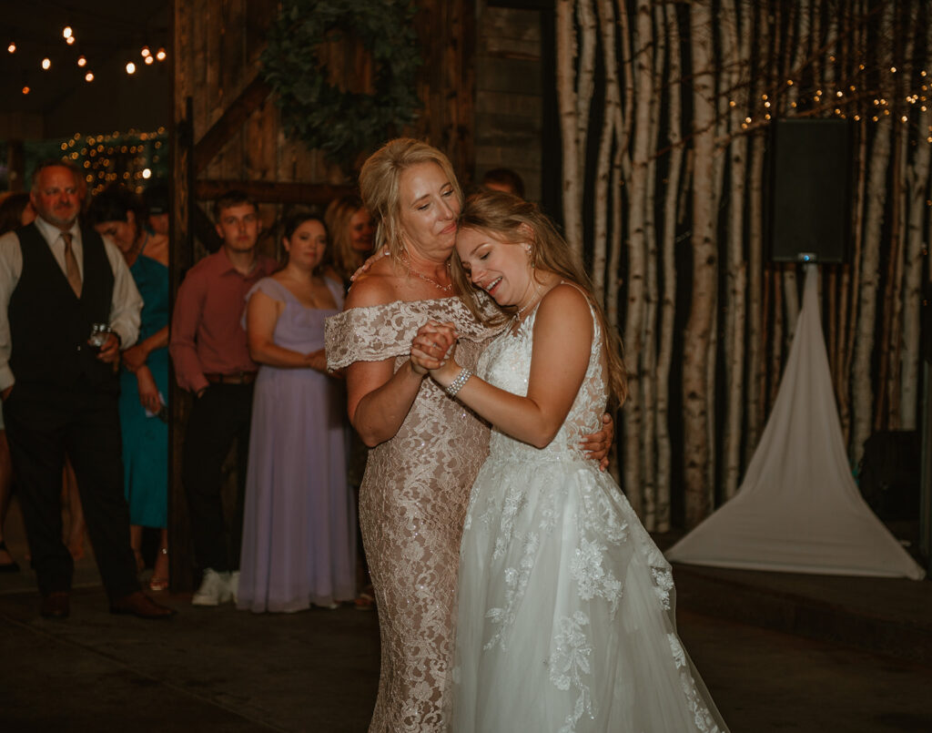 emotional moment during the bride and mother dance