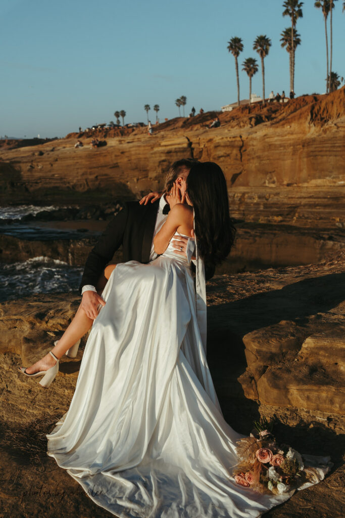 Detailed close-up of the golden sandstone cliffs at Sunset Cliffs Natural Park, San Diego, elopement backdrop